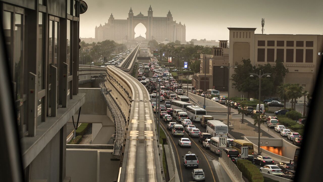 A picture taken from a station of Dubai's Palm Monorail shows traffic on a road in Palm Jumeirah on Aug. 28, 2025. 