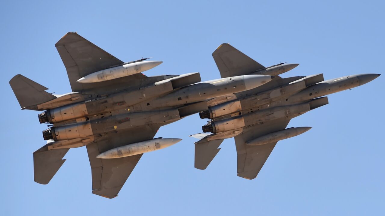 Saudi Air Force advanced F-15SA fighter jets perform during a ceremony in Riyadh on Jan. 25, 2017.