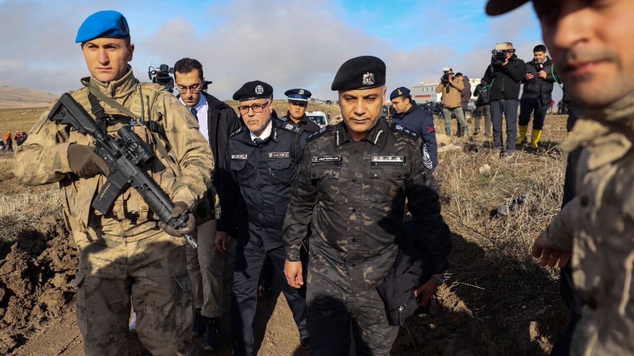 Members of a Libyan military delegation visited the crash site