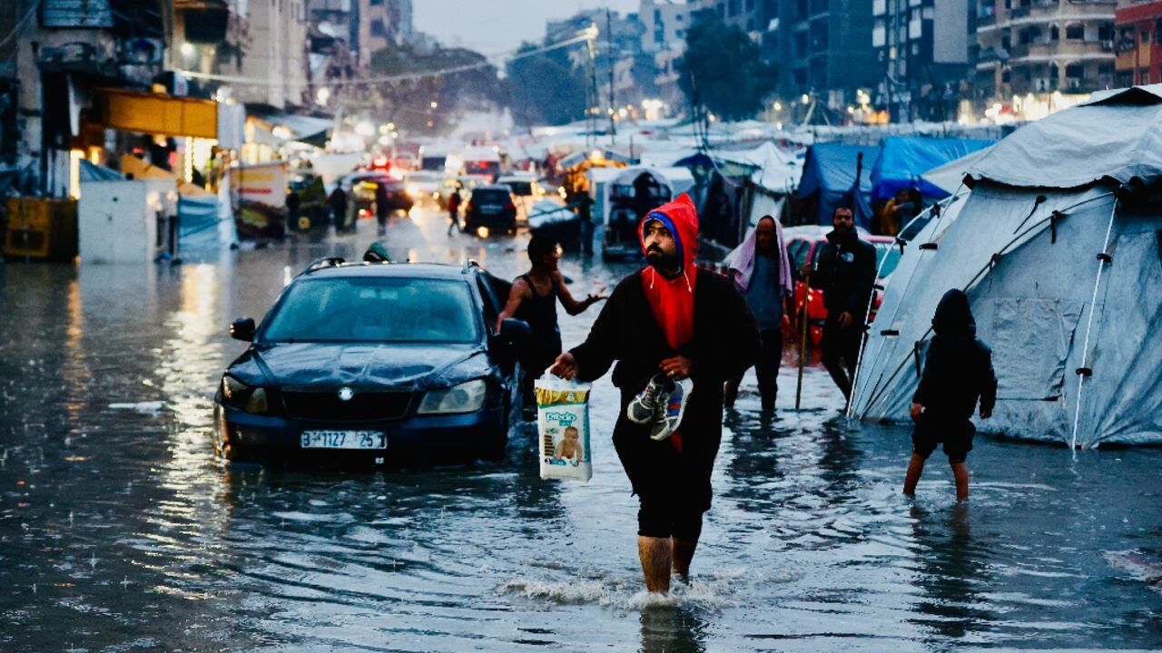 The UN says not enough aid is entering Gaza, where winter floods are compounding people's woes