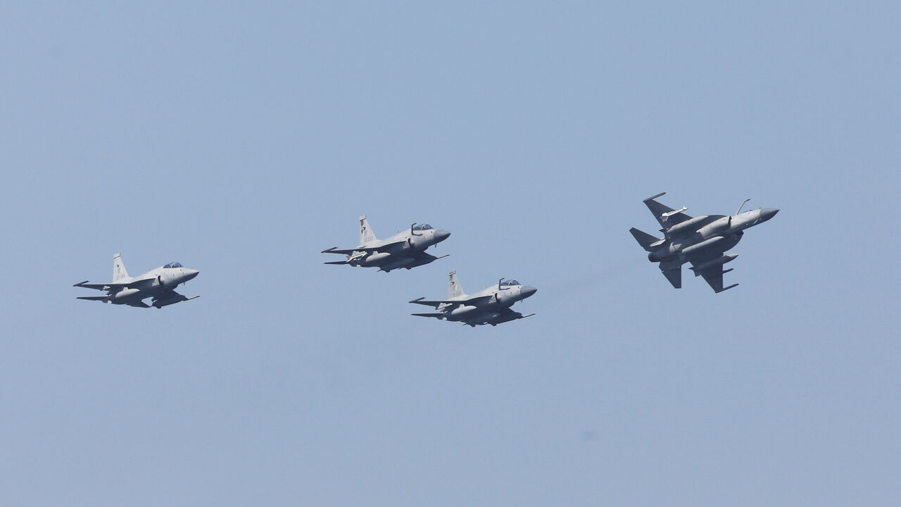 Pakistan Air Force's JF-17 Thunder jets fly past during the sea phase of Pakistan Navy's Multinational Exercise AMAN-23, in the North Arabian Sea near Karachi, Pakistan, February 13, 2023. REUTERS/Akhtar Soomro/File Photo
