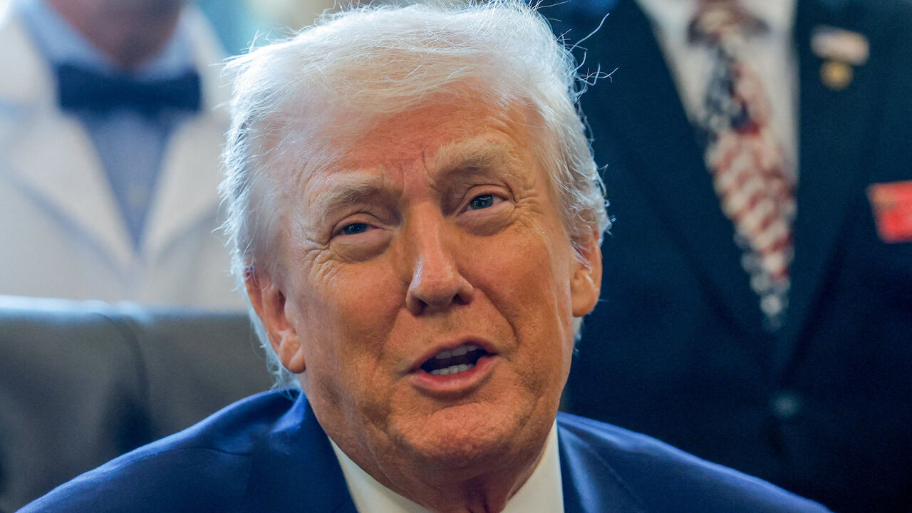 U.S. President Donald Trump speaks, as he signs an executive order recommending loosening the federal regulations on marijuana, in the Oval Office at the White House in Washington, D.C., U.S., December 18, 2025. REUTERS/Evelyn Hockstein
