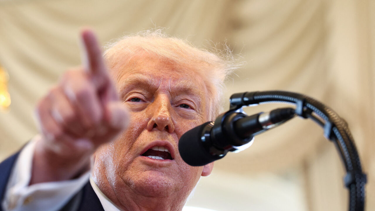 U.S. President Donald Trump speaks at a ceremony in Palm Beach,  Florida, U.S., January 16, 2026.  REUTERS/Kevin Lamarque