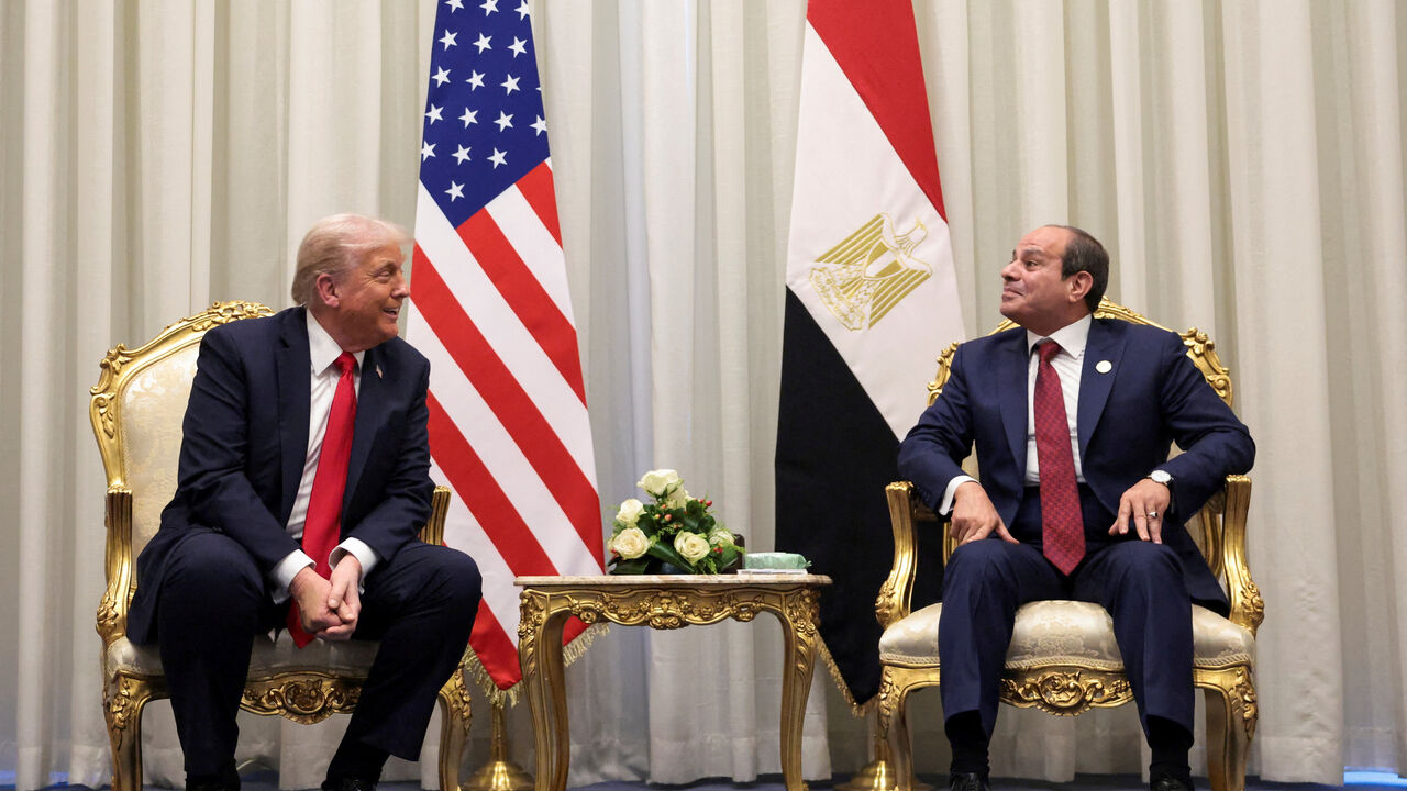 U.S. President Donald Trump and Egyptian President Abdel Fattah el-Sisi meet ahead of a world leaders' summit on ending the Gaza war, amid a U.S.-brokered prisoner-hostage swap and ceasefire deal between Israel and Hamas, in Sharm El-Sheikh, Egypt, October 13, 2025. REUTERS/Evelyn Hockstein