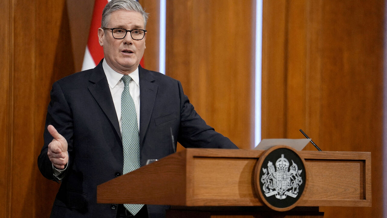 FILE PHOTO: British Prime Minister Keir Starmer speaks to the media in the briefing room of 9 Downing Street in central London, Britain, after U.S. President Donald Trump's threats to ramp up tariffs until a deal is reached for the U.S. to buy Greenland. January 19, 2026. Jordan Pettitt/Pool via REUTERS//File Photo
