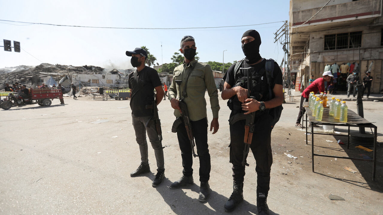Hamas police officers stand guard, amid a ceasefire between Israel and Hamas, in Gaza City, October 11, 2025. REUTERS/Stringer