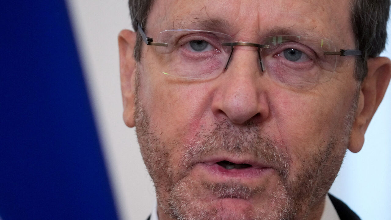 FILE PHOTO: Israeli President Isaac Herzog speaks during a press conference with Latvian President Edgars Rinkevics in Riga, Latvia August 5, 2025. REUTERS/Ints Kalnins/File Photo