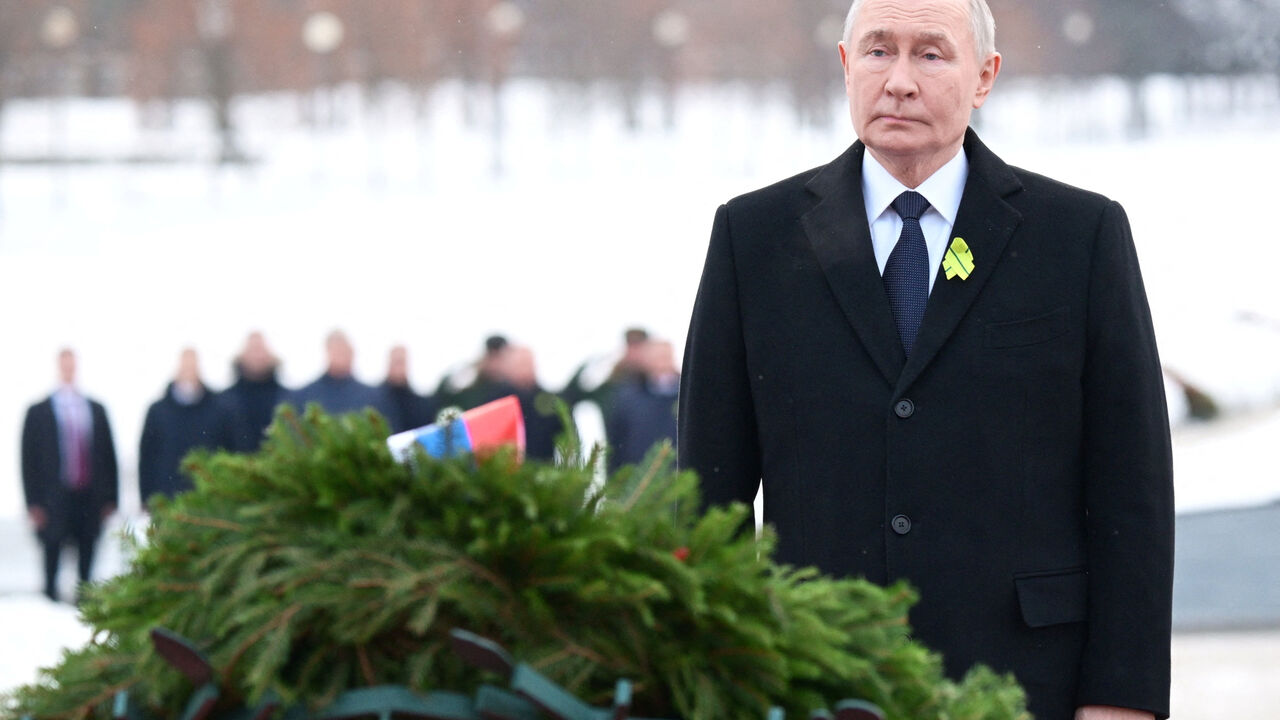 FILE PHOTO: Russian President Vladimir Putin attends a flower-laying ceremony by the Motherland monument at the Piskaryovskoye Memorial Cemetery to mark the anniversary of Soviet forces breaking the Nazi siege of Leningrad in 1944 during World War Two, in Saint Petersburg, January 27, 2026. Sputnik/Alexei Danichev/Pool via REUTERS/File Photo