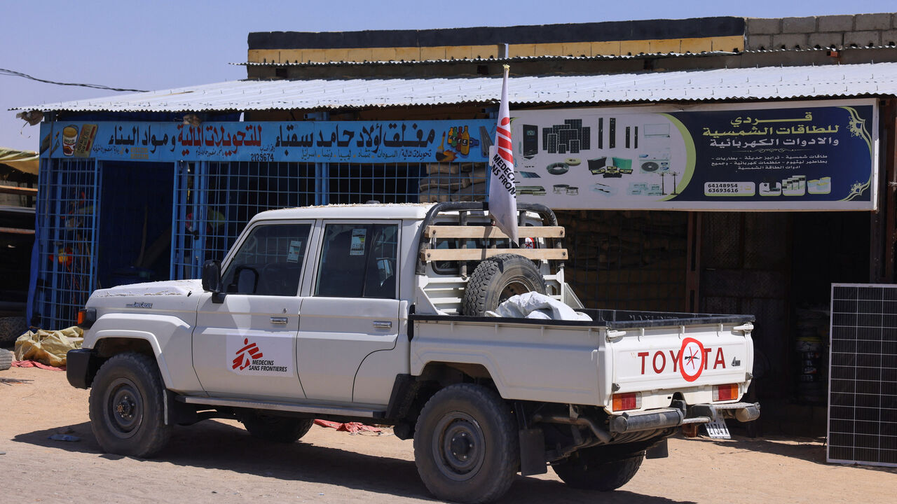 A pickup truck of the Medecins Sans Frontieres (MSF), stands in front of a market stall for solar energy equipment, in the city of Tine, eastern Chad, November 25, 2025. REUTERS/Amr Abdallah Dalsh