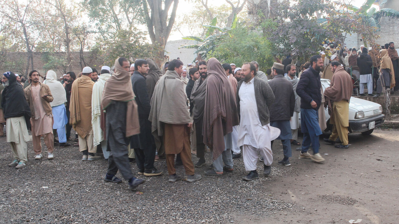 Residents from Tirah valley, who fled a remote mountainous region bordering Afghanistan, gather to get themself registered, in Bara, Khyber District of Khyber Pakhtunkhwa province, Pakistan, January 30, 2026. REUTERS/Muhammad Amin Afridi