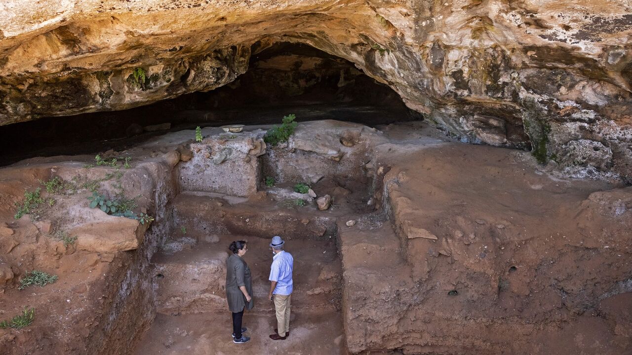 Archaeologists at the entrance of the Contrebandiers (Smugglers) Cave, some 12 miles from the Moroccan capital, Rabat, Sept. 18, 2021.