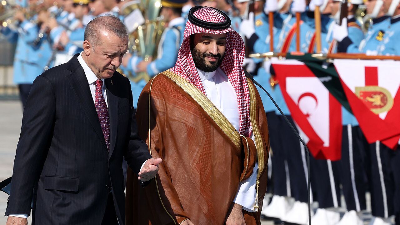 Turkish President Recep Tayyip Erdogan (L) gestures as he welcomes Crown Prince of Saudi Arabia Mohammed bin Salman (R) during an official ceremony at the Presidential Complex in Ankara, on June 22, 2022.