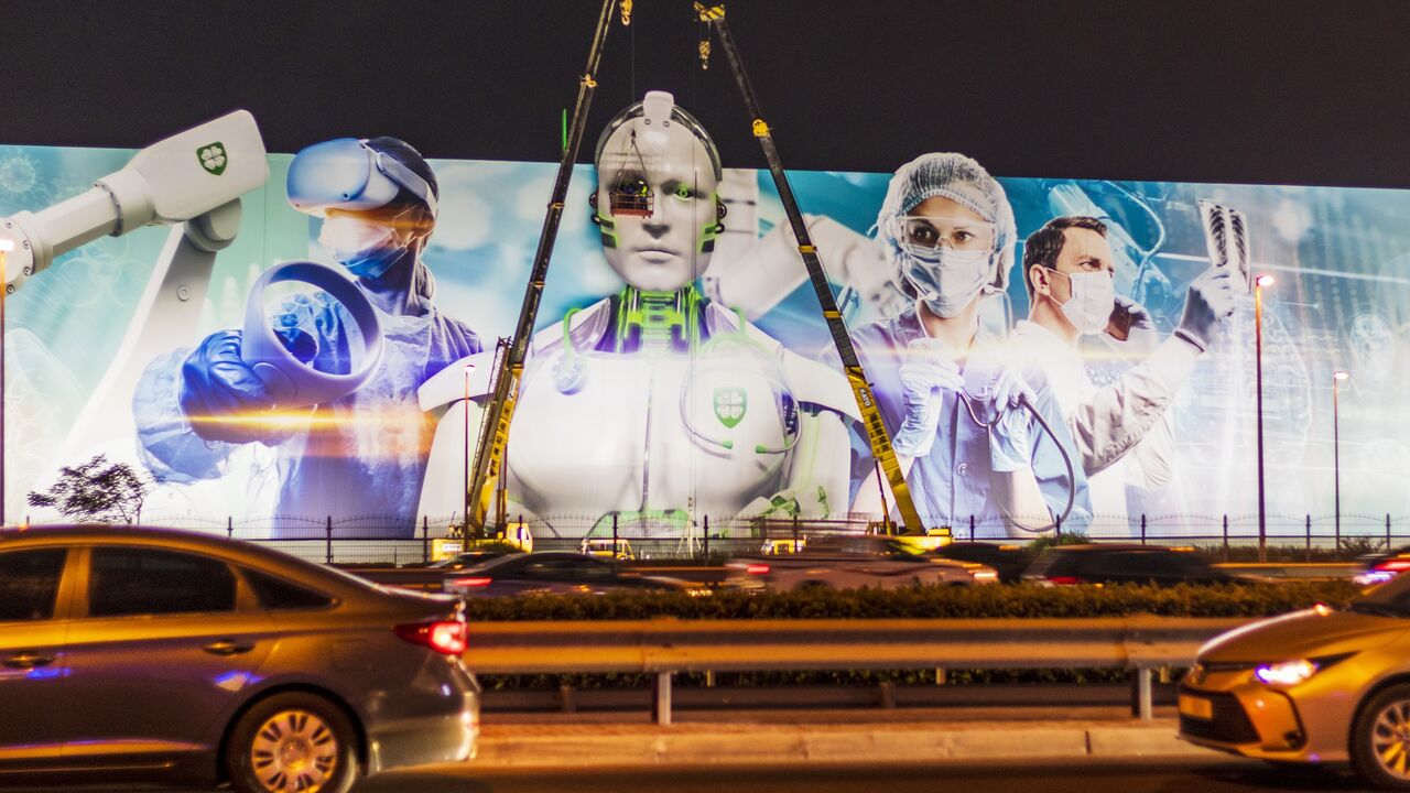 Advertisement boards on main road of the city Sheikh Zayed Road.