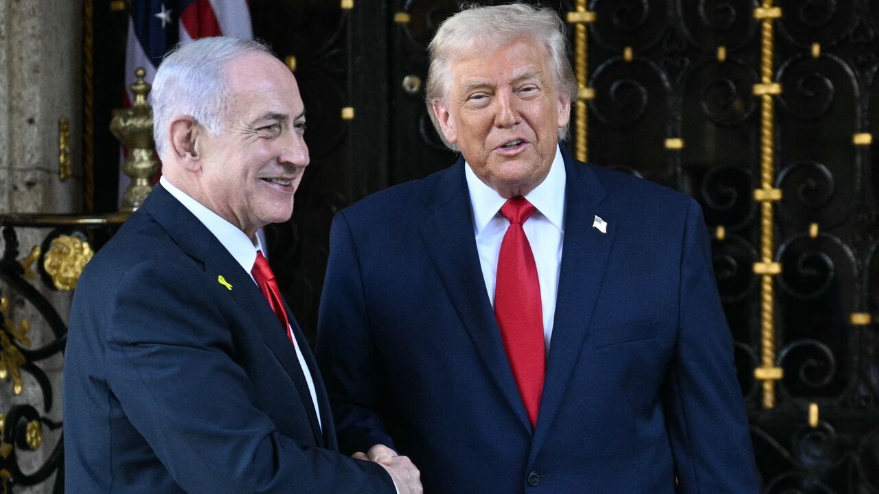 US President Donald Trump (R) greets Israeli Prime Minister Benjamin Netanyahu (L) at Trump's Mar-a-Lago residence in Palm Beach, Florida, Dec. 29, 2025.
