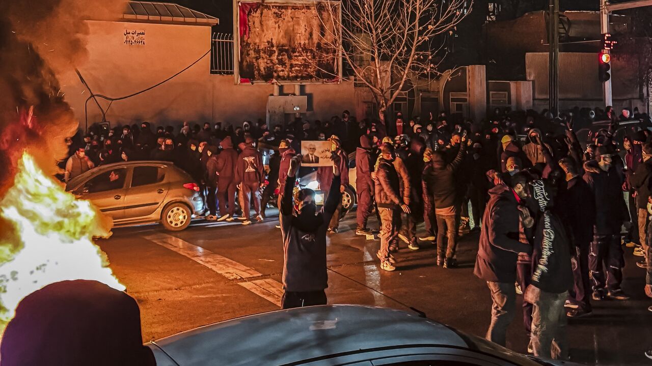 Iranians gather while blocking a street during a protest in Tehran, Iran, on Jan. 9, 2026.