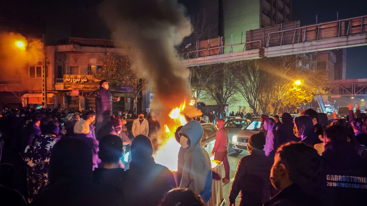 Fires are lit as protesters rally on Jan. 8, 2026 in Tehran, Iran. 