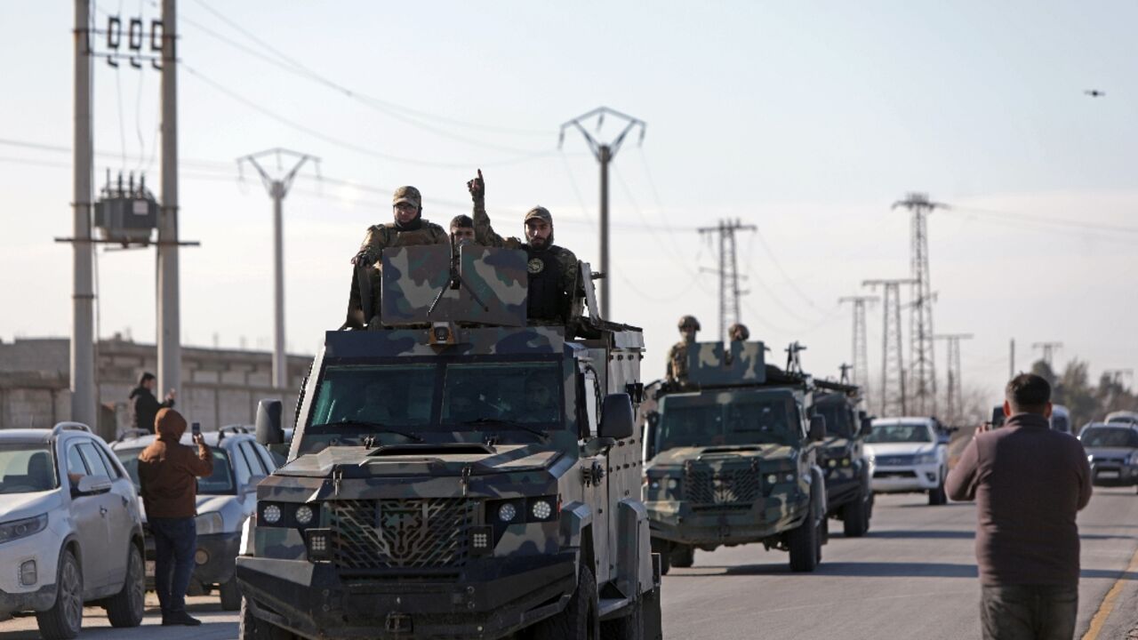 Syria's army told civilians to stay away from Kurdish military positions east of Aleppo after it moved reinforcements to the area 