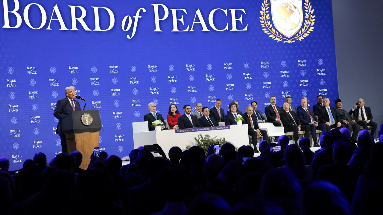 U.S. President Donald Trump speaks during a charter announcement for his Board of Peace initiative aimed at resolving global conflicts, alongside the 56th annual World Economic Forum (WEF), in Davos, Switzerland, January 22, 2026. REUTERS/Jonathan Ernst