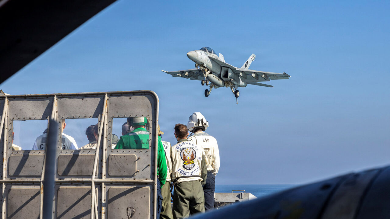 An F/A-18F Super Hornet prepares to make an arrested landing on the flight deck of the U.S. Navy's Nimitz-class aircraft carrier USS Abraham Lincoln (CVN 72) in the Arabian Sea February 15, 2026.  U.S. Navy/Mass Communication Specialist Seaman Daniel Kimmelman/Handout via REUTERS