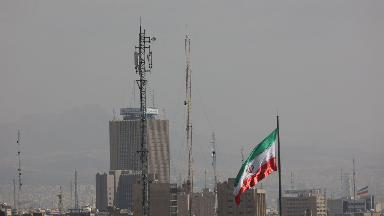 An Iranian flag flutters, as Israel and the U.S. launched strikes on Iran, in Tehran, Iran, February 28, 2026. Majid Asgaripour/WANA (West Asia News Agency) via REUTERS