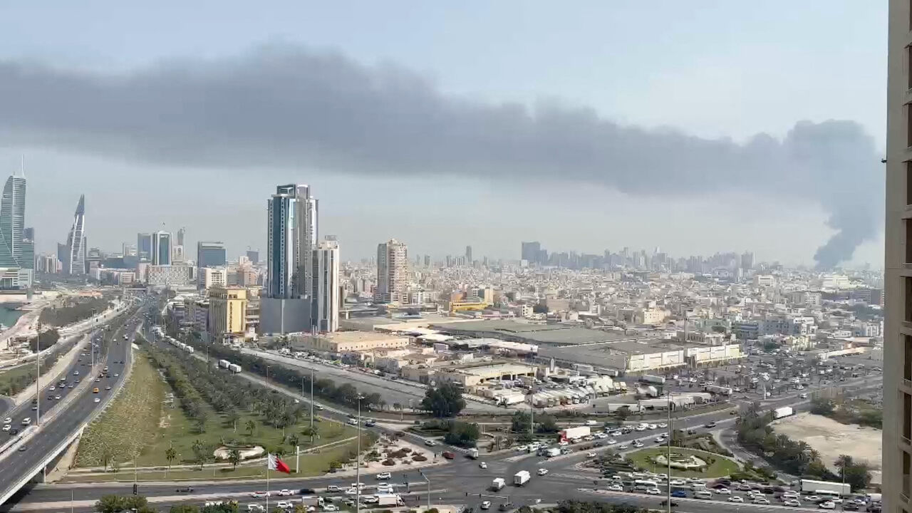 Smoke rises after the state news agency reported missile attack on the service center of the U.S. Fifth Fleet, following strikes by the United States and Israel against Iran, in Manama, Bahrain February 28, 2026 in this still image obtained from a video. Video obtained by Reuters/via REUTERS