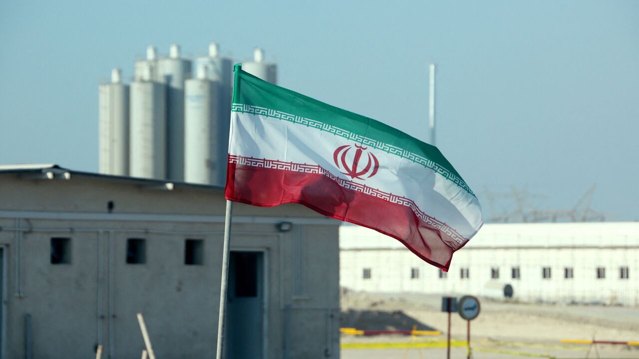 A picture taken on November 10, 2019, shows an Iranian flag in Iran's Bushehr nuclear power plant, during an official ceremony to kick-start works on a second reactor at the facility. 