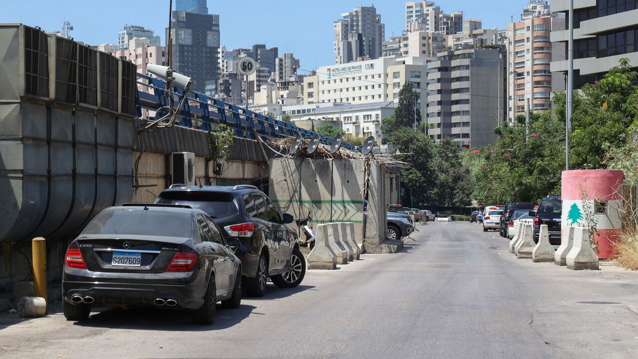 A picture shows a view of a street with access to a detention center under the Adliyeh (Palace of Justice) bridge (L) of Lebanon's capital Beirut, on Aug. 7, 2022.