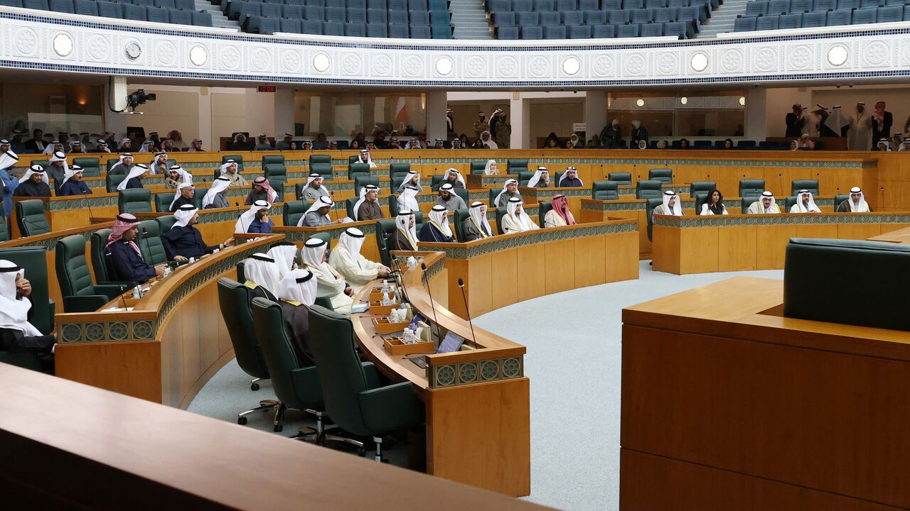 Kuwaiti members of parliament attend a special session for the swearing in ceremony for the prime minister and his cabinet ministers, at the National Assembly in Kuwait City on Jan. 29, 2024. 