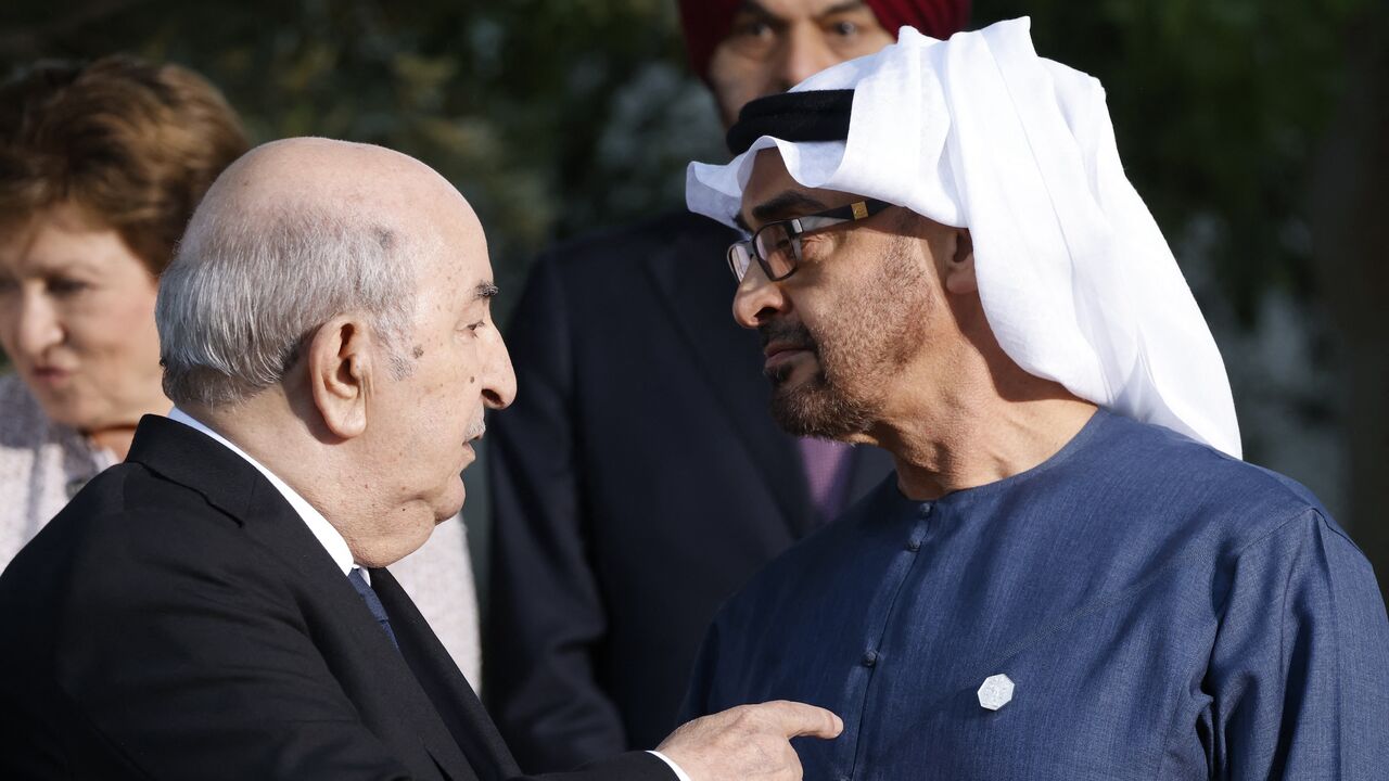 Algeria's President Abdelmadjid Tebboune (L) speaks with UAE President Sheikh Mohamed bin Zayed during the G7 Summit hosted by Italy, in Savelletri, on June 14, 2024.