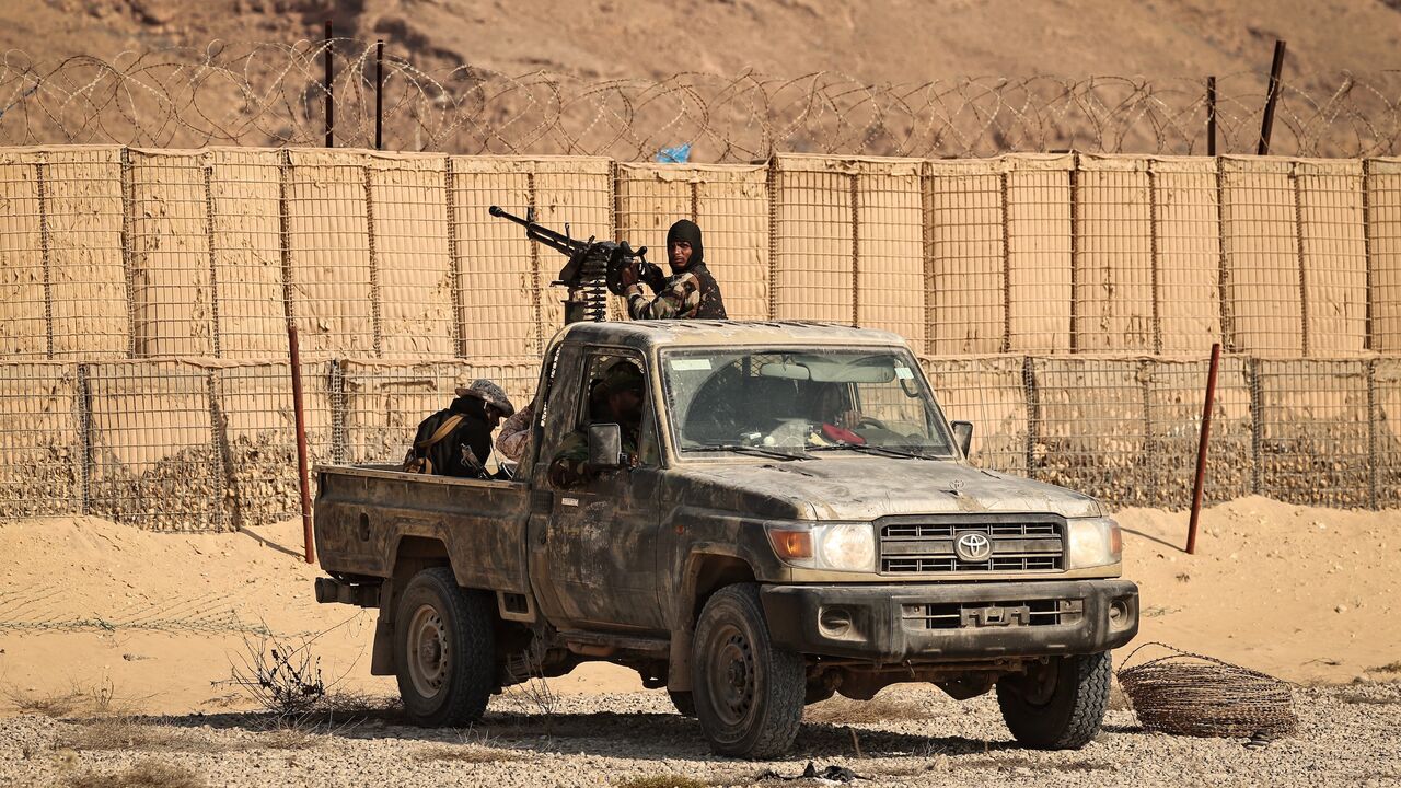 This photograph taken on Jan. 20, 2026, organized by the Saudi-backed Yemeni government, shows Saudi-backed Yemeni forces in the city of Mukalla in Yemen's coastal southern Hadhramaut province. 