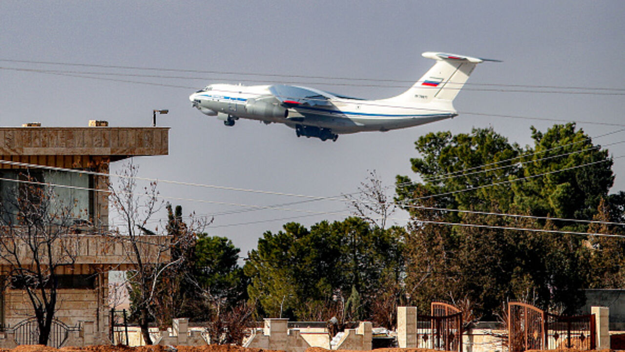 A Russian military Ilyushin Il-76 strategic airlift aircraft takes off from Qamishli International Airport in northeastern Syria's Hasakah province on January 27, 2026. Russia withdrew troops and equipment on January 27 from the airport in Kurdish-held northeast Syria where its forces were based, as Kurdish forces who once controlled swathes of territory in the country's north and east have withdrawn in the face of military pressure of Syrian army advance while the country's new Islamist authorities seek to