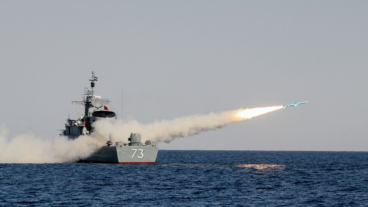 A missile launches from IRIS Sabalan, an Alvand-class frigate of the Iranian Navy, during the Velayat 91 drill in the Gulf of Oman on January 1, 2013. The Velayat 91 drill is a sixday Iranian naval exercise held in late December 2012 and early January 2013 across the Strait of Hormuz, the Sea of Oman, and the northern Indian Ocean to test naval readiness and secure strategic waterways. (Photo by Mohammadali Najib / Middle East Images / AFP via Getty Images)