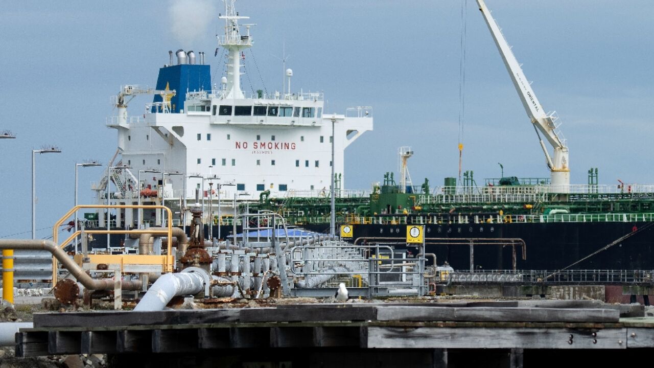 A tanker unloads oil in Wellington, New Zealand, on March 27, 2026
