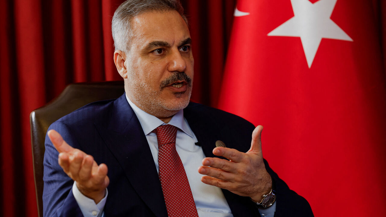 Turkish Foreign Minister Hakan Fidan speaks during an interview with Reuters at the 23rd edition of the annual Doha Forum, in Doha, Qatar, December 6, 2025. REUTERS/Ibraheem Abu Mustafa