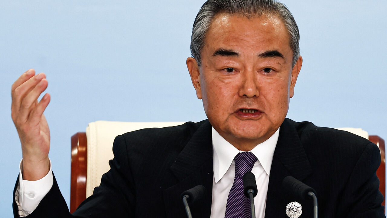 Chinese Foreign Minister Wang Yi speaks at a press conference on the sidelines of the Third Belt and Road Forum (BRF), at the media centre in Beijing, China October 18, 2023. REUTERS/Tingshu Wang