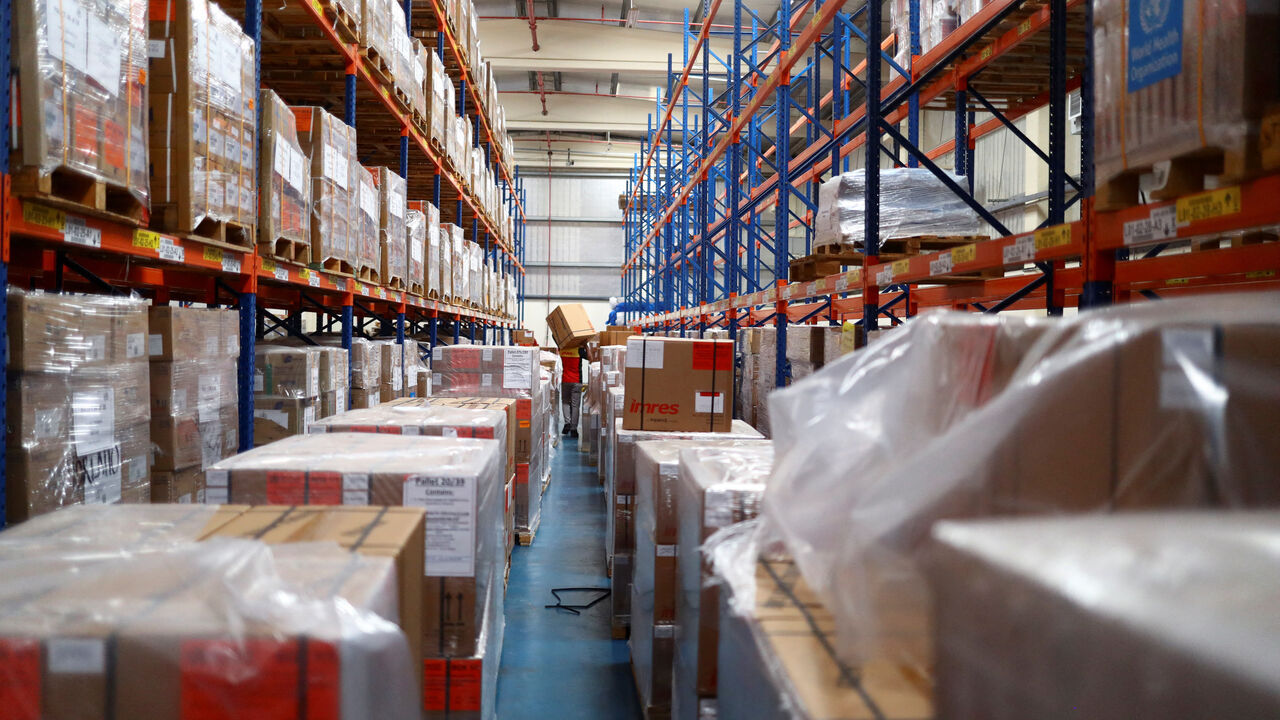 FILE PHOTO: A contractor moves a World Health Organization (WHO) humanitarian relief box ahead of flights sponsored by the International Humanitarian City (IHC) to Turkey and Syria which were devastated by an earthquake, in Dubai, United Arab Emirates, February 7, 2023. REUTERS/Amr Alfiky/File Photo