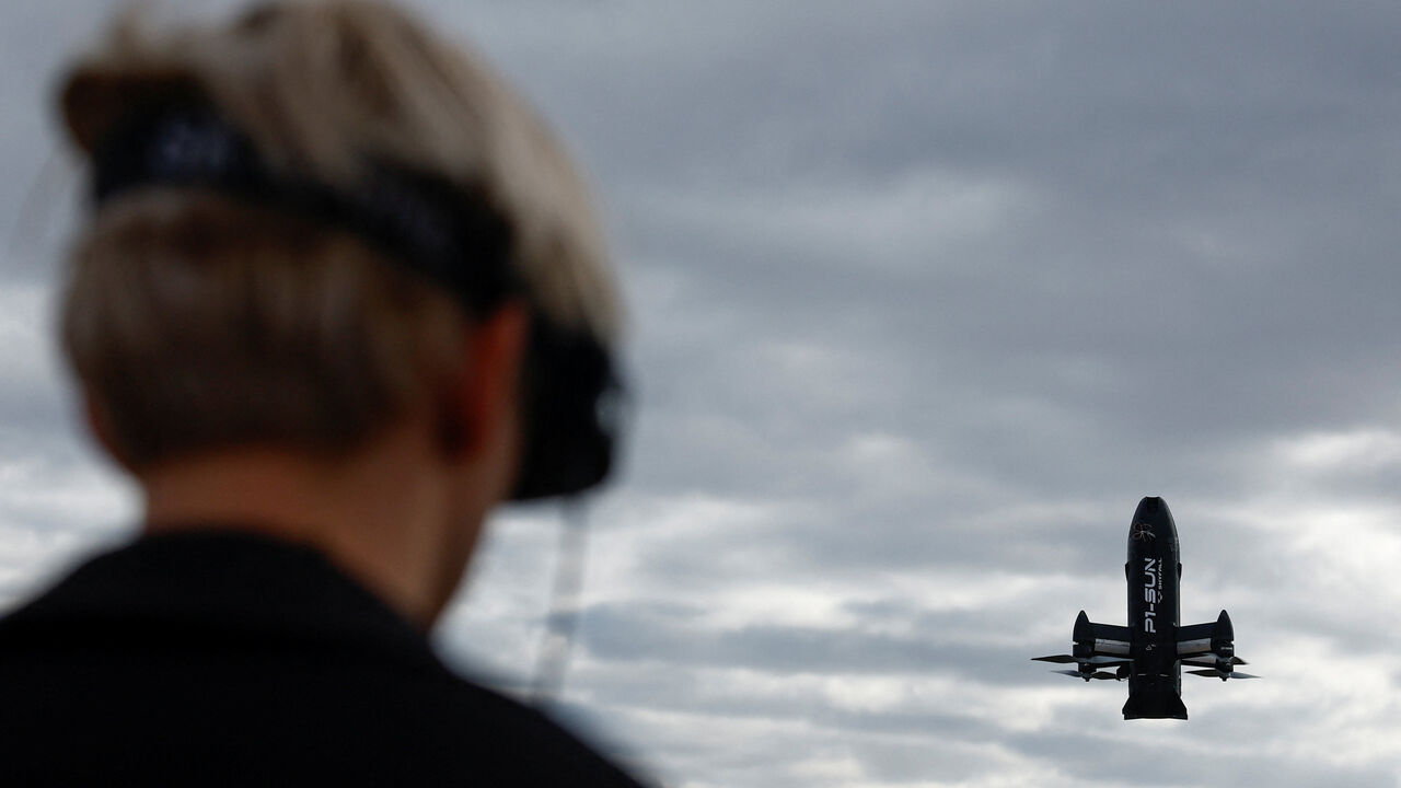 A employee of SkyFall company operates a P1-Sun FPV interceptor drone during a test fly at a training ground, amid Russia's attack on Ukraine, in an undisclosed location, Ukraine March 6, 2026. REUTERS/Valentyn Ogirenko