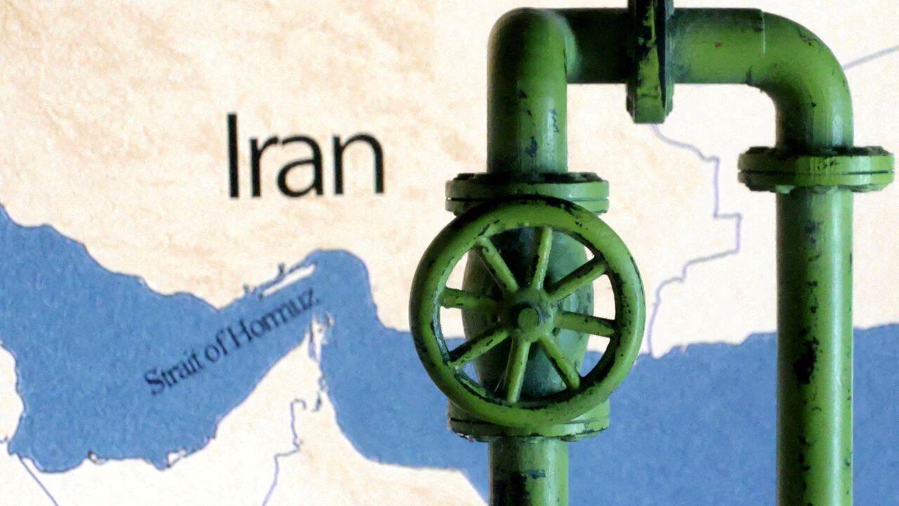 A map showing the Strait of Hormuz and Iran is seen behind a 3D printed oil pipeline in this illustration taken June 22, 2025. REUTERS/Dado Ruvic/Illustration