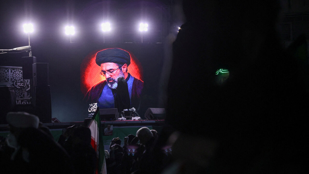 A picture of Iran's new supreme leader, Mojtaba Khamenei, is displayed on a screen in Tehran, amid the U.S.-Israeli conflict with Iran, in Tehran, Iran, March 9, 2026. Majid Asgaripour/WANA (West Asia News Agency) via REUTERS