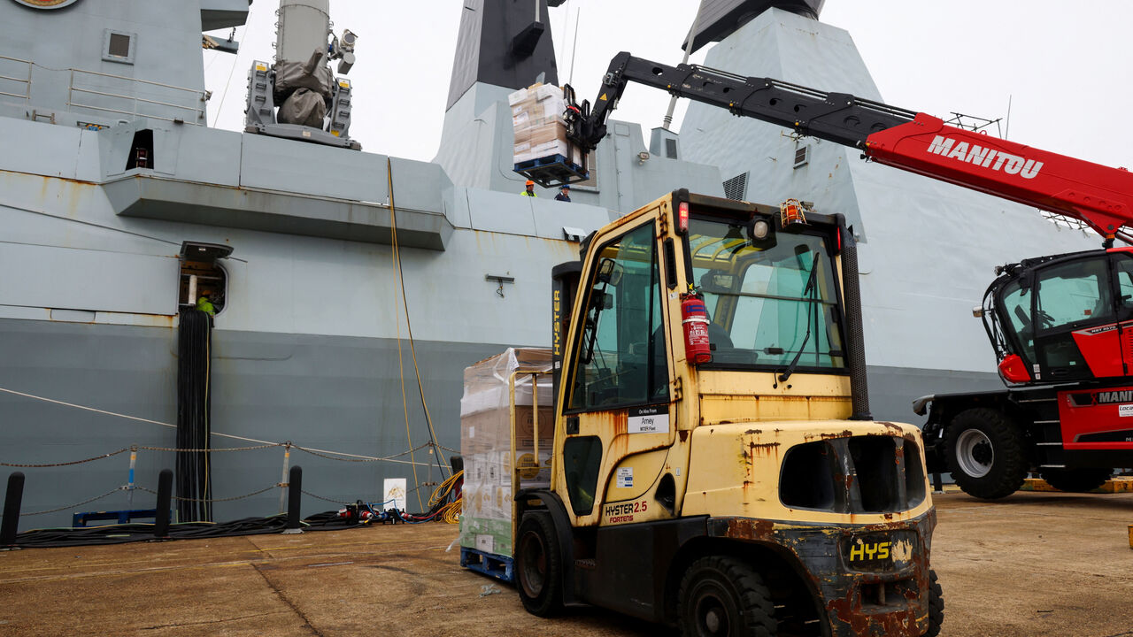 Supplies are loaded on HMS Dragon as it prepares to deploy to the Mediterranean, in Portsmouth, Britain, March 8, 2026. PO Phot Chris Sellars/UK MOD/Handout via REUTERS