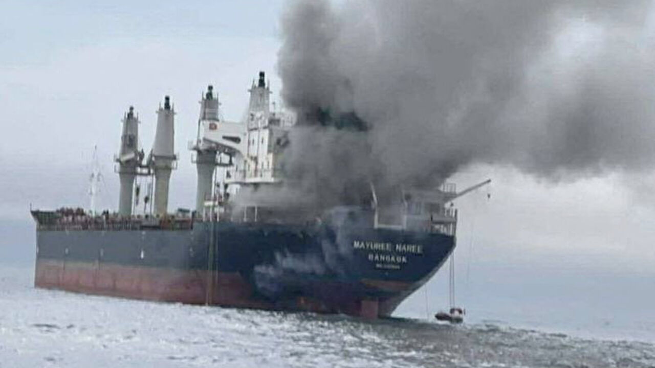 The Thailand-flagged cargo ship Mayuree Naree engulfed in black smoke in the Strait of Hormuz, March 11, 2026. ROYAL THAI NAVY/Handout via REUTERS