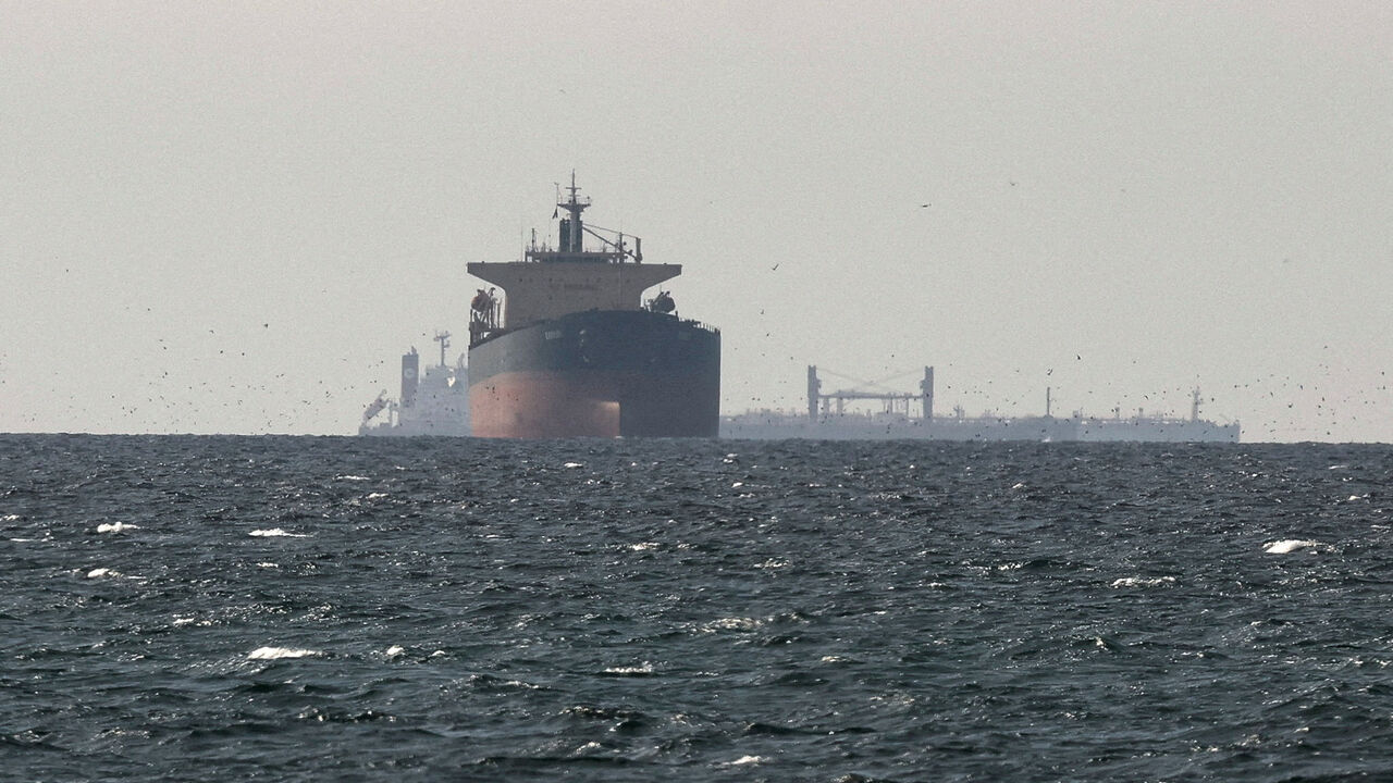 FILE PHOTO: Tankers sail in the Gulf, near the Strait of Hormuz, as seen from northern Ras al-Khaimah, near the border with Oman’s Musandam governance, amid the U.S.-Israeli conflict with Iran, in United Arab Emirates, March 11, 2026. REUTERS/Stringer/File Photo