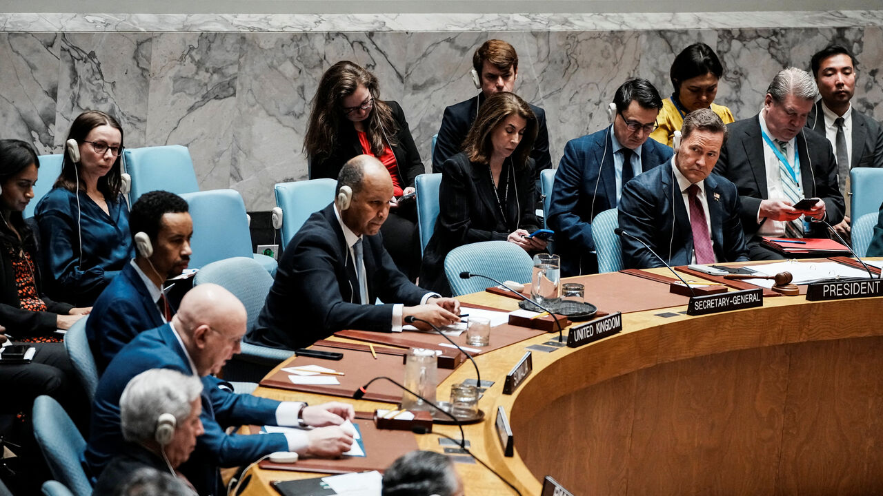 United States Ambassador to the United Nations Mike Waltz listens to Russian ambassador to the United Nations Vassily Nebenzia as he addresses the United Nations Security Council during a meeting on a sanctions resolution regarding the situation in Iran and the Middle East at U.N. headquarters in New York City, U.S., March 12, 2026. REUTERS/Eduardo Munoz