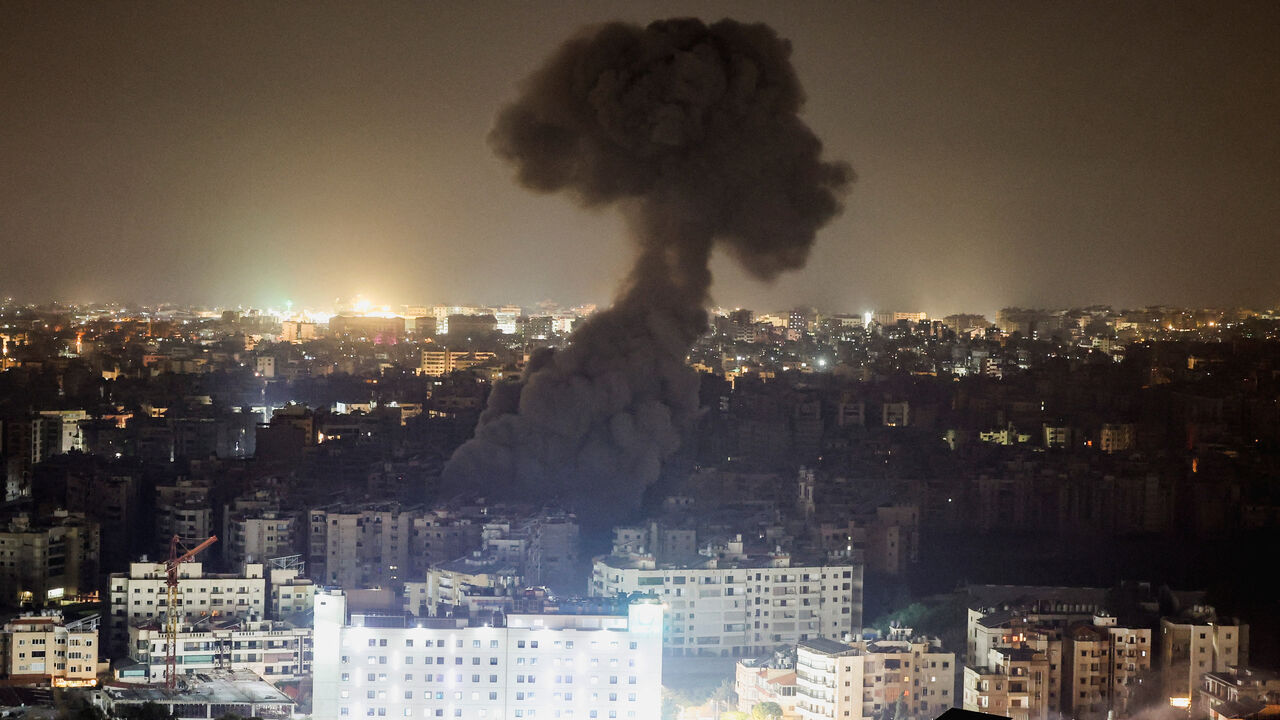 A plume of smoke covers the city skyline following reported Israeli strikes in the southern suburbs of Beirut, after an escalation between Hezbollah and Israel, amid the U.S.-Israeli conflict with Iran, Lebanon, March 13, 2026. REUTERS/Amr Abdallah Dalsh     TPX IMAGES OF THE DAY