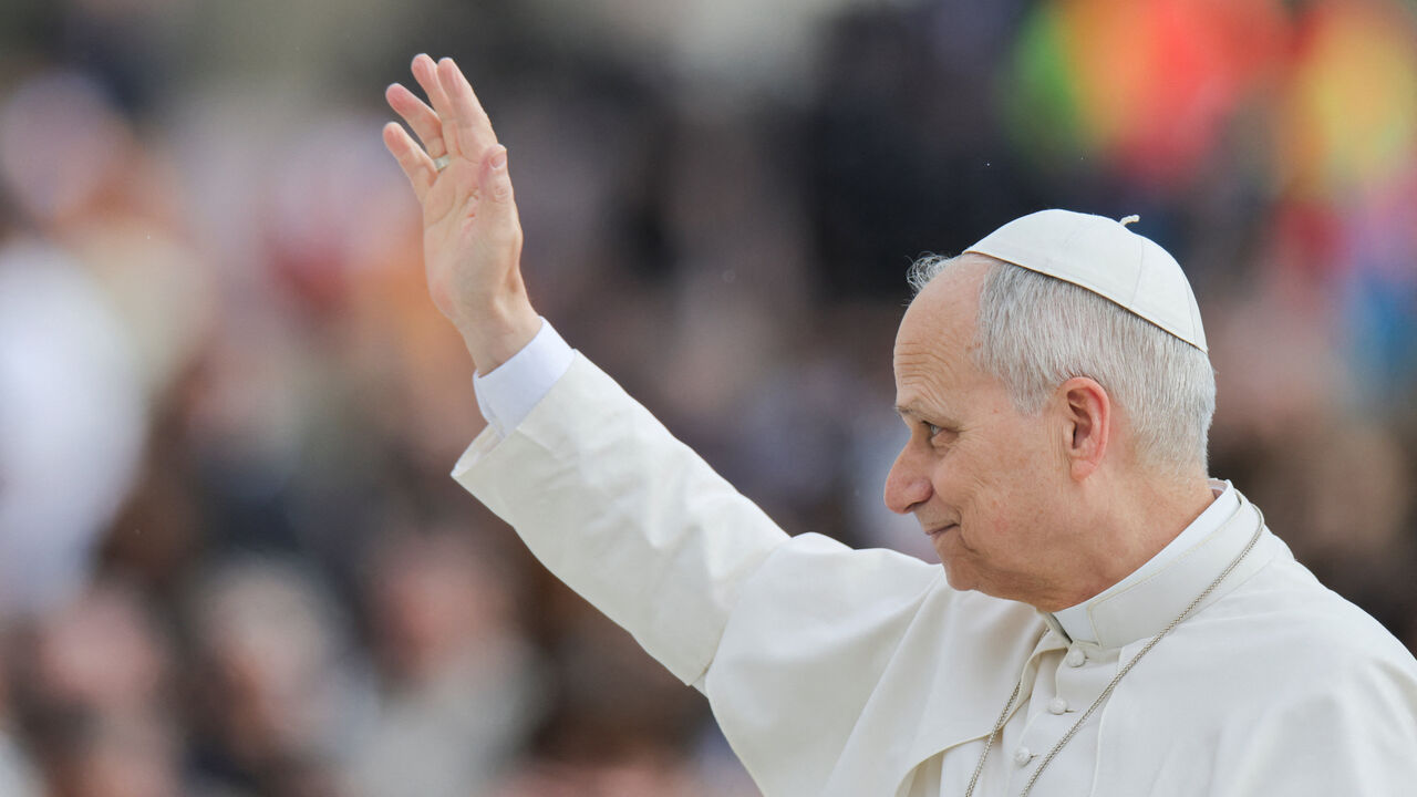 Pope Leo XIV waves on the day he holds the weekly general audience in Saint Peter's Square at the Vatican, March 11, 2026. REUTERS/Yara Nardi