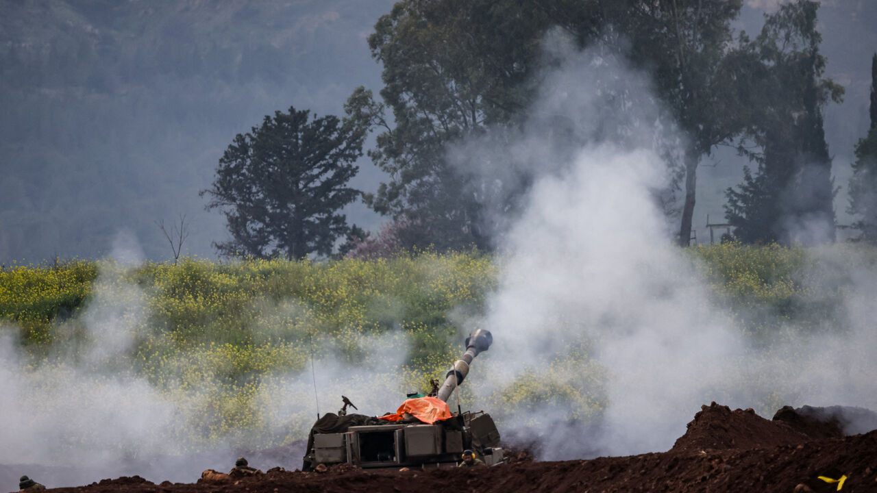 Israeli soldiers use an artillery unit, amid escalation between Hezbollah and Israel, and amid the U.S.-Israeli conflict with Iran, on the Israeli side of the Israel-Lebanon border, March 15, 2026. REUTERS/Shir Torem