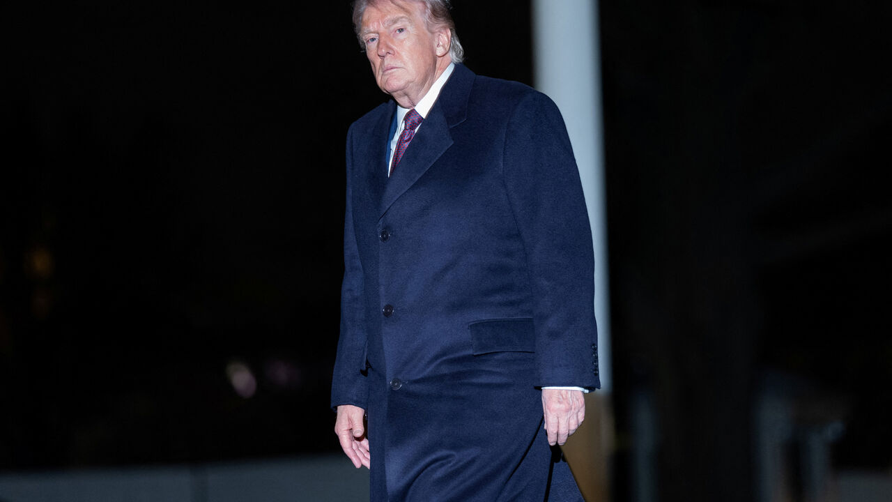 U.S. President Donald Trump walks as he arrives back at the White House in Washington, D.C., U.S., March 15, 2026. REUTERS/Aaron Schwartz