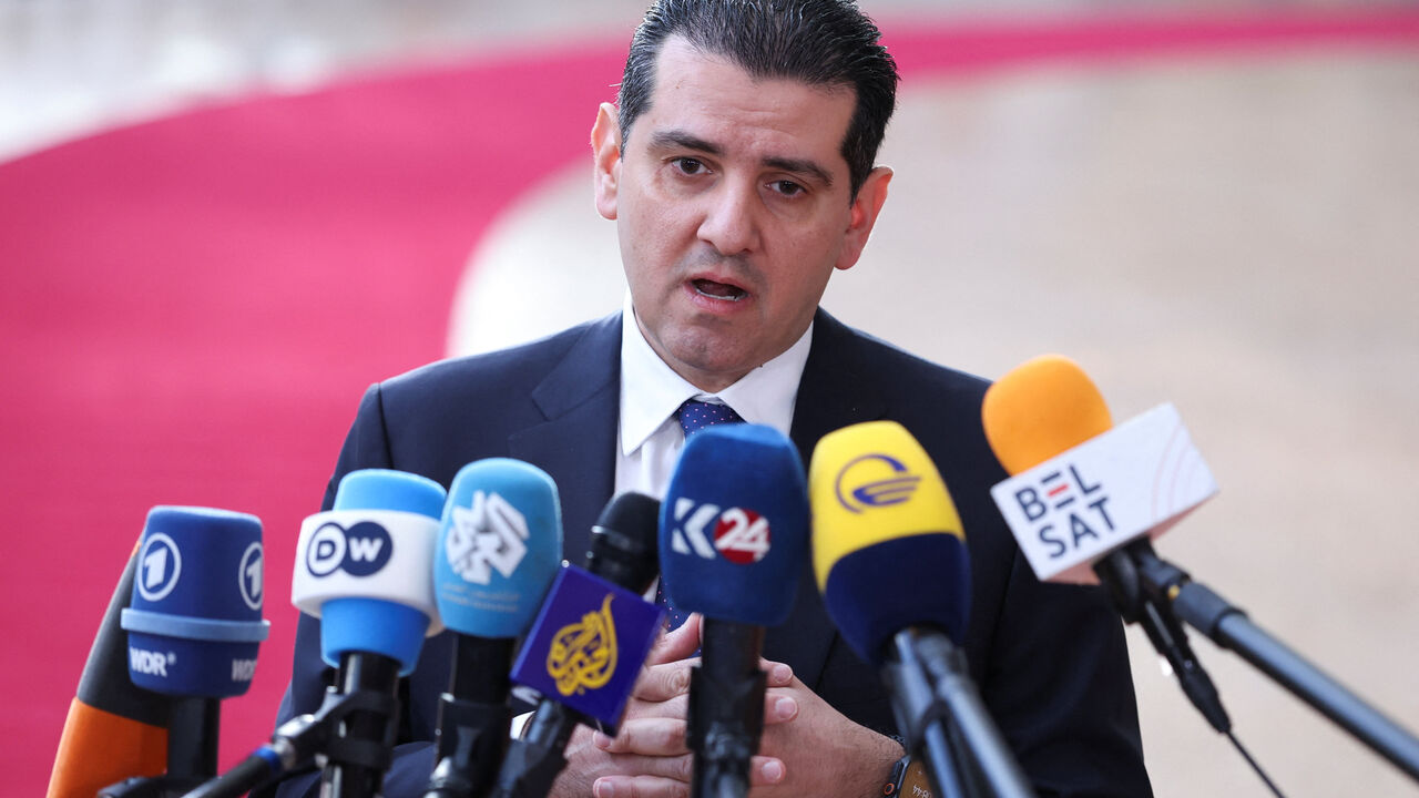 Cyprus' Minister of Energy, Commerce and Industry Michalis Damianos speaks to members of the media as he arrives to attend a European Union Energy and Foreign Affairs ministers meeting in Brussels, Belgium March 16, 2026. REUTERS/Omar Havana