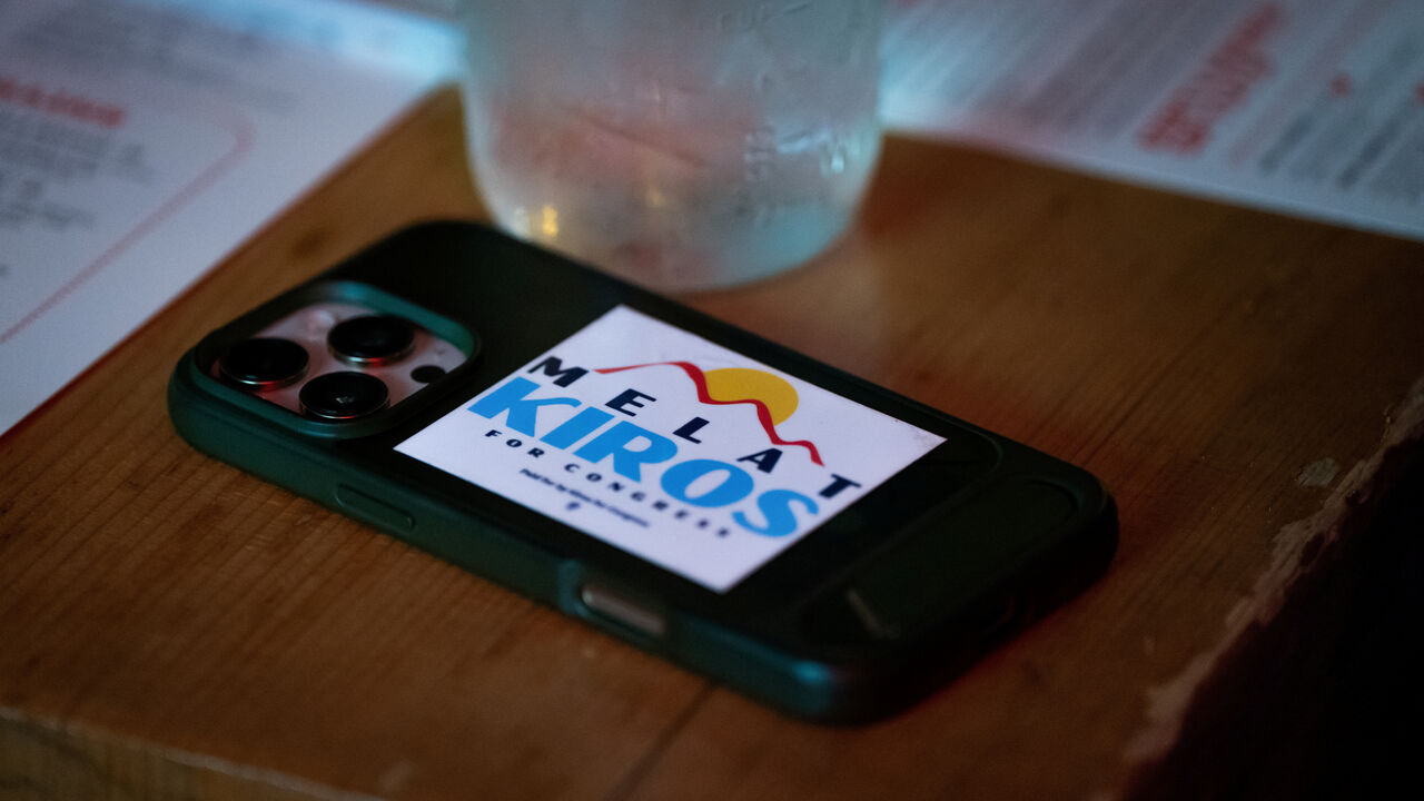 A campaign sticker adorns a phone case during an event with Melat Kiros, Democratic candidate for the U.S. House of Representatives from Colorado's 1st Congressional District, and members of Washington, D.C.'s Ethiopian diaspora at Punch Bowl Social in Arlington, Virginia, U.S., March 15, 2026. REUTERS/Elizabeth Frantz