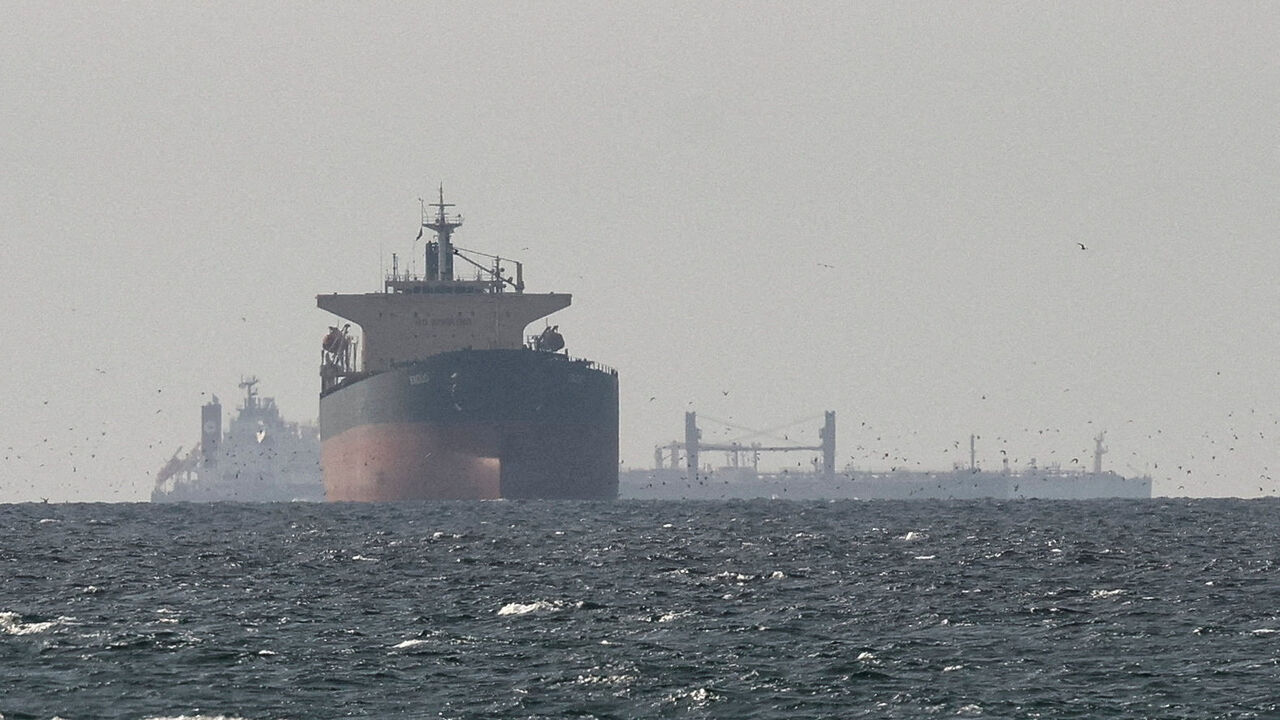 FILE PHOTO: Tankers sail in the Gulf, near the Strait of Hormuz, as seen from northern Ras al-Khaimah, near the border with Oman’s Musandam governance, amid the U.S.-Israeli conflict with Iran, in United Arab Emirates, March 11, 2026. REUTERS/Stringer/File Photo